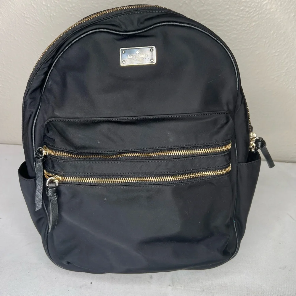 Kate Spade black gold zippers back pack